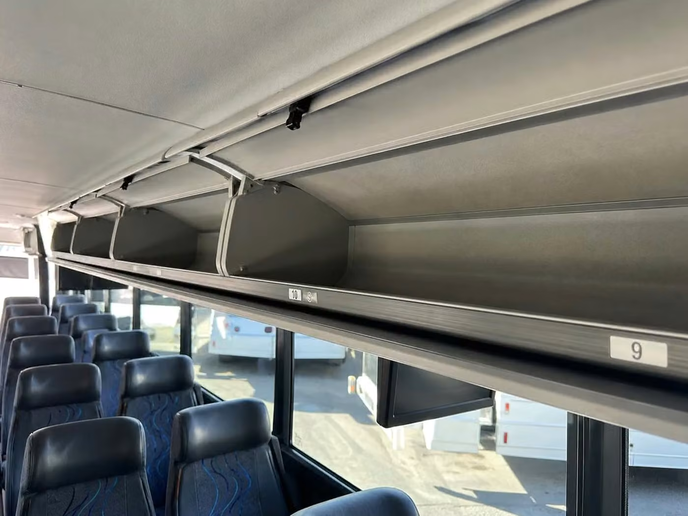 bella vista 56 passenger charter bus overhead storage