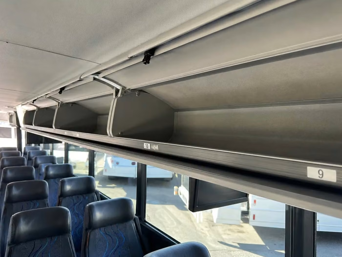 bella vista charter bus overhead storage